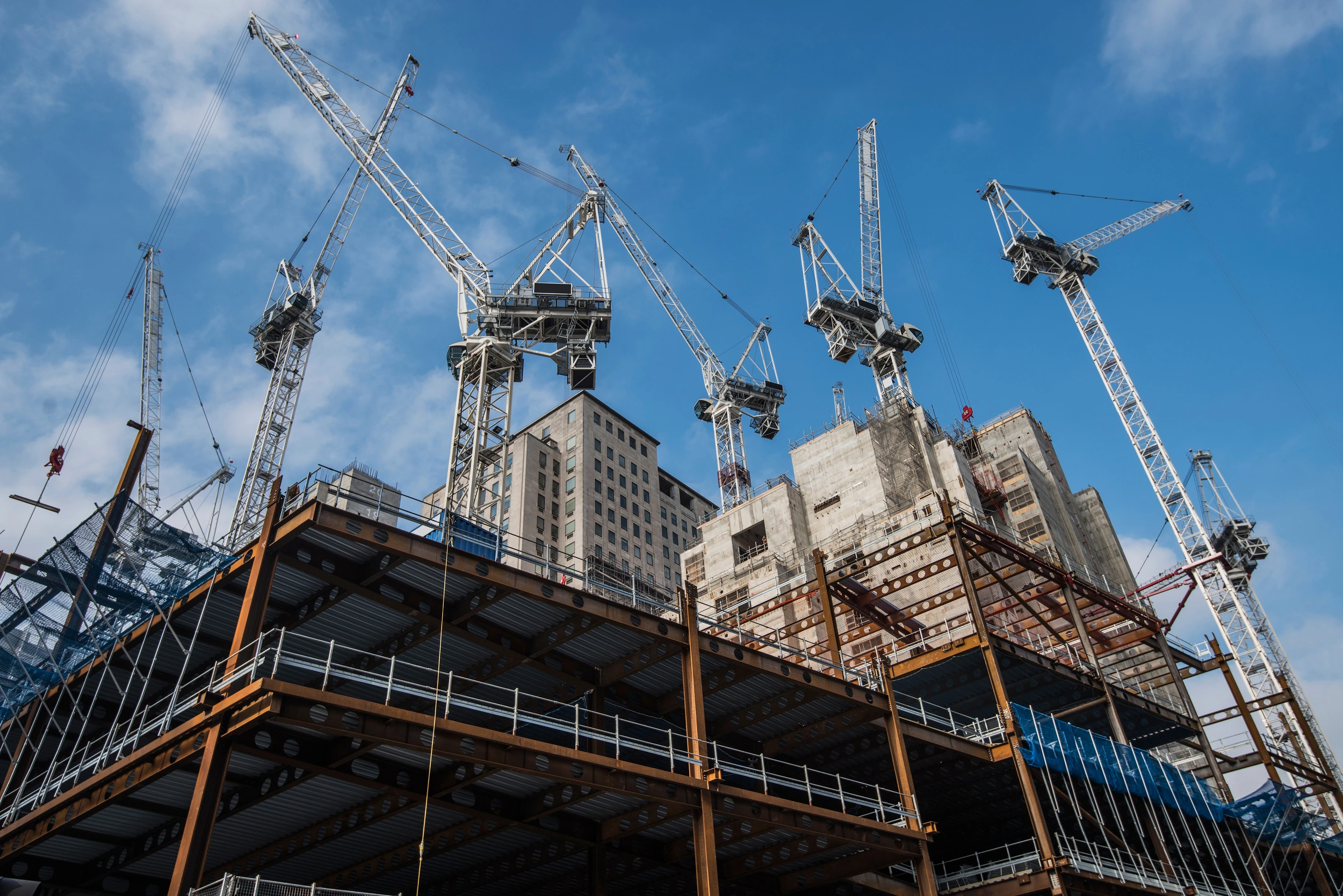 Cranes above a commercial construction site
